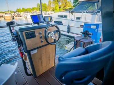 Cockpit of Roma, a Woma D13 motorboat at Fürstenberg/Havel, Germany