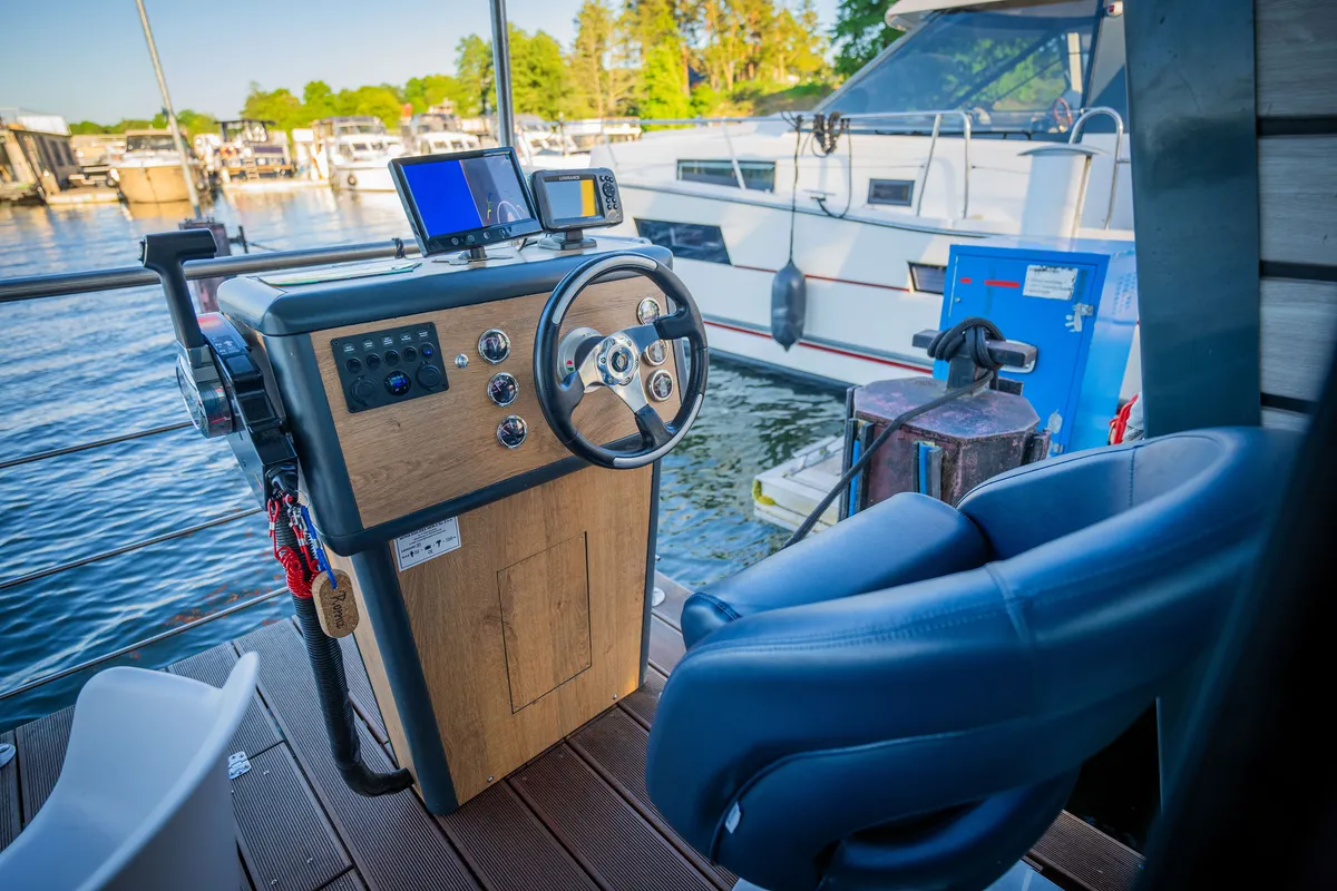 Cockpit of Roma, a Woma D13 motorboat at Fürstenberg/Havel, Germany