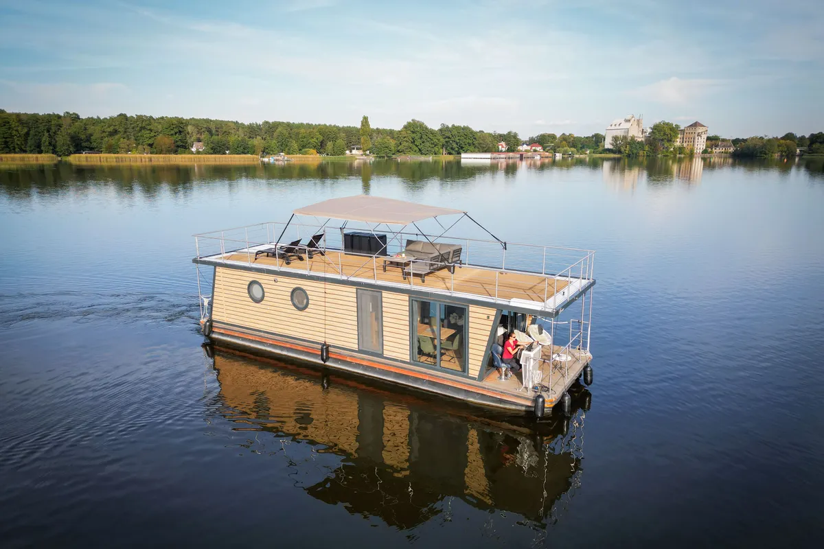 Exterior view of Roma, a Woma D13 motorboat at Fürstenberg/Havel, Germany