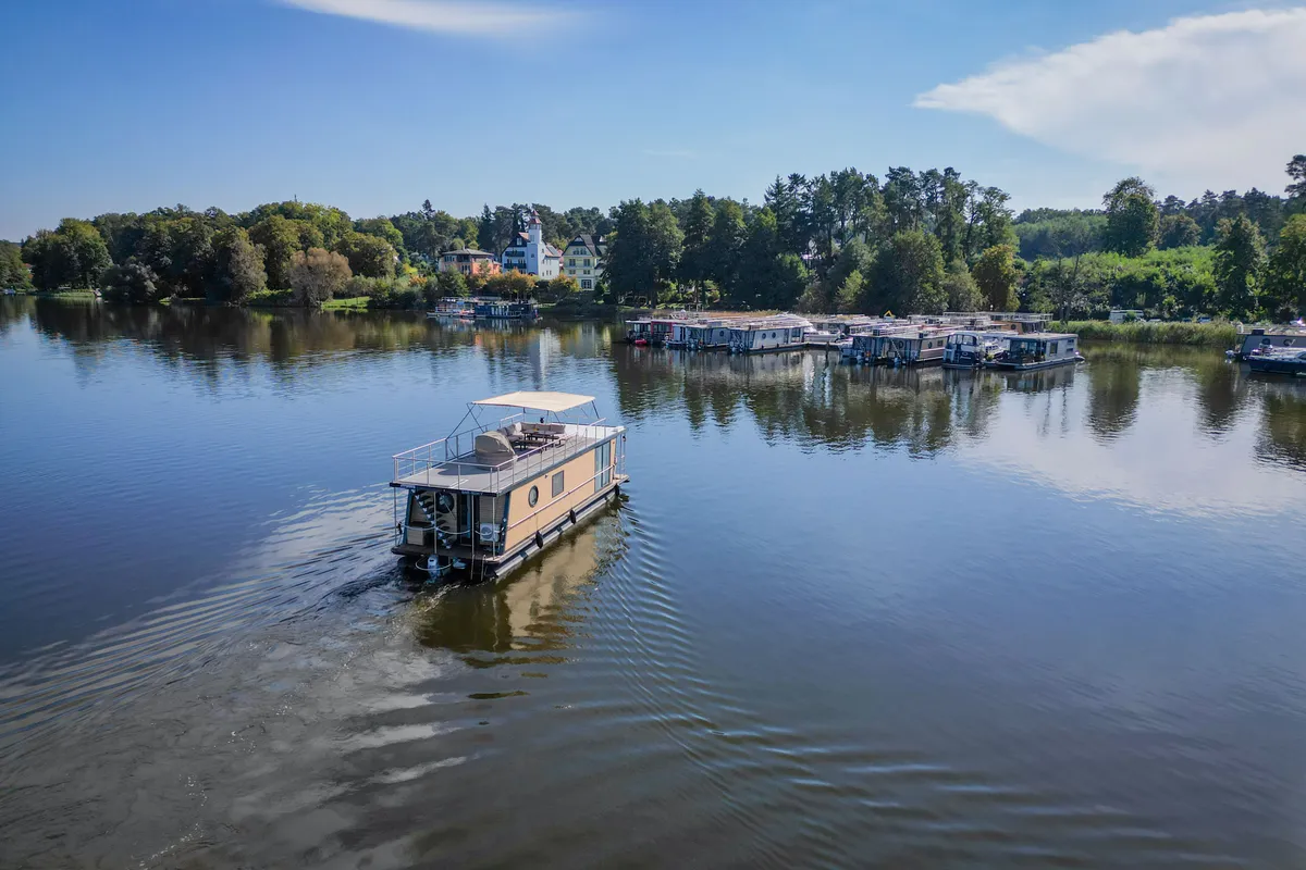 Exterior view of Roma, a Woma D13 motorboat at Fürstenberg/Havel, Germany