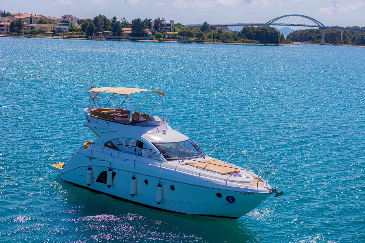 Exterior view of Lamona, a Beneteau Monte Carlo 47 Fly motor yacht at Općina Sukošan, Croatia