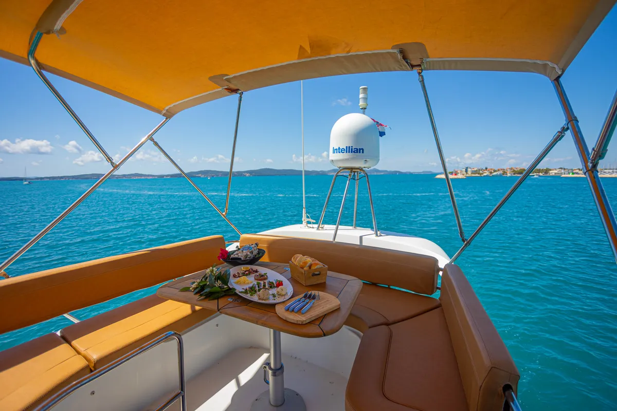 Deck of Lamona, a Beneteau Monte Carlo 47 Fly motor yacht at Općina Sukošan, Croatia