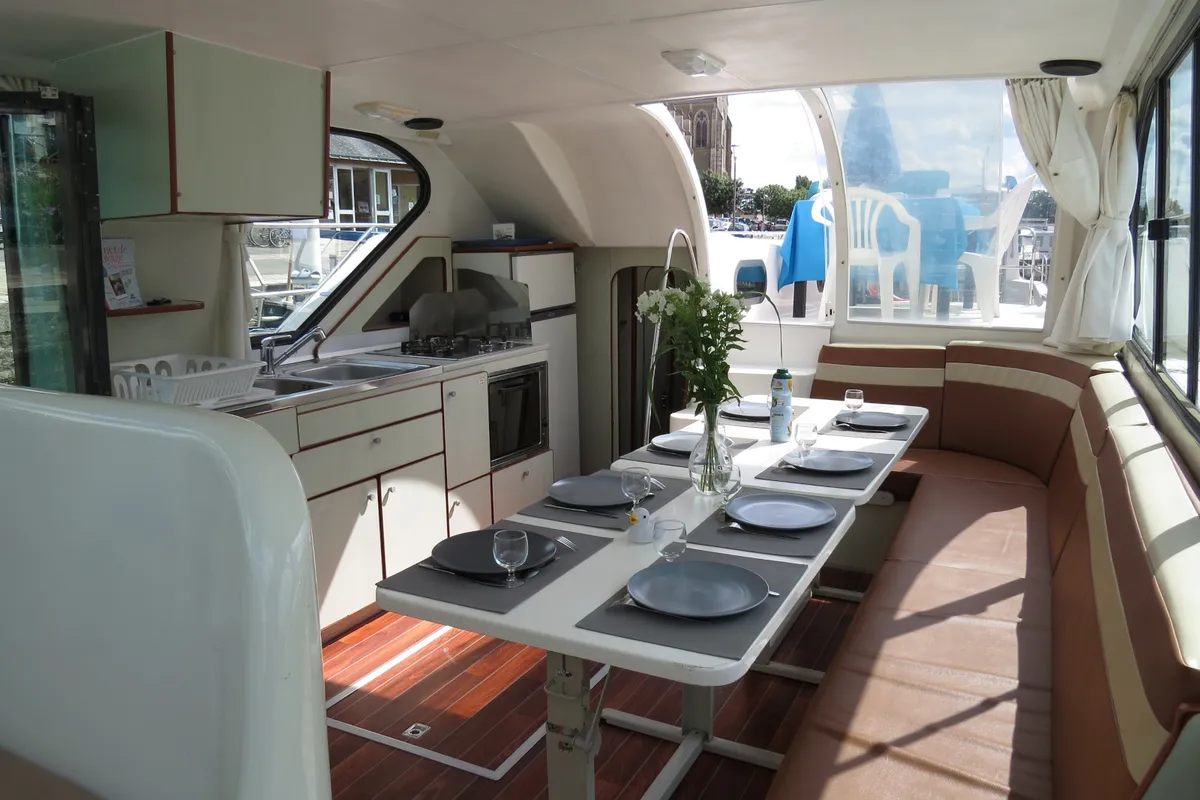 Salon of Vivat, a Nicols Confort 1350 motorboat at Grez-Neuville, France