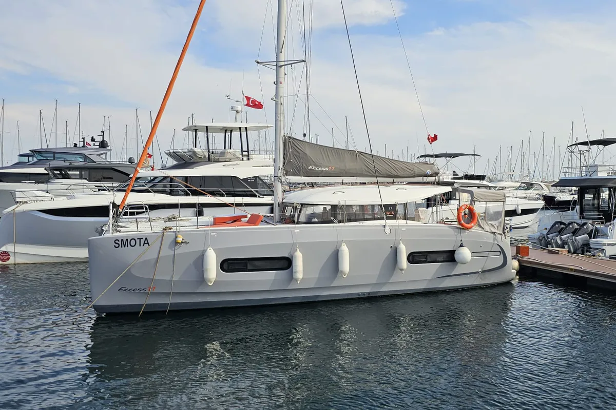 Exterior view of SMOTA, a Excess 11 catamaran at Fethiye, Turkey