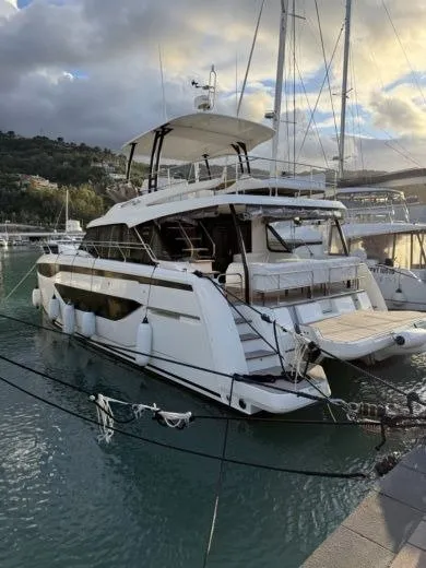 Main, a Prestige M48 catamaran at Giardini Naxos, Italy