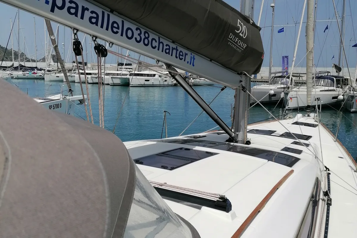 Exterior view of Parbleu, a Dufour 390 Grand Large sailboat at Capo d'Orlando, Italy