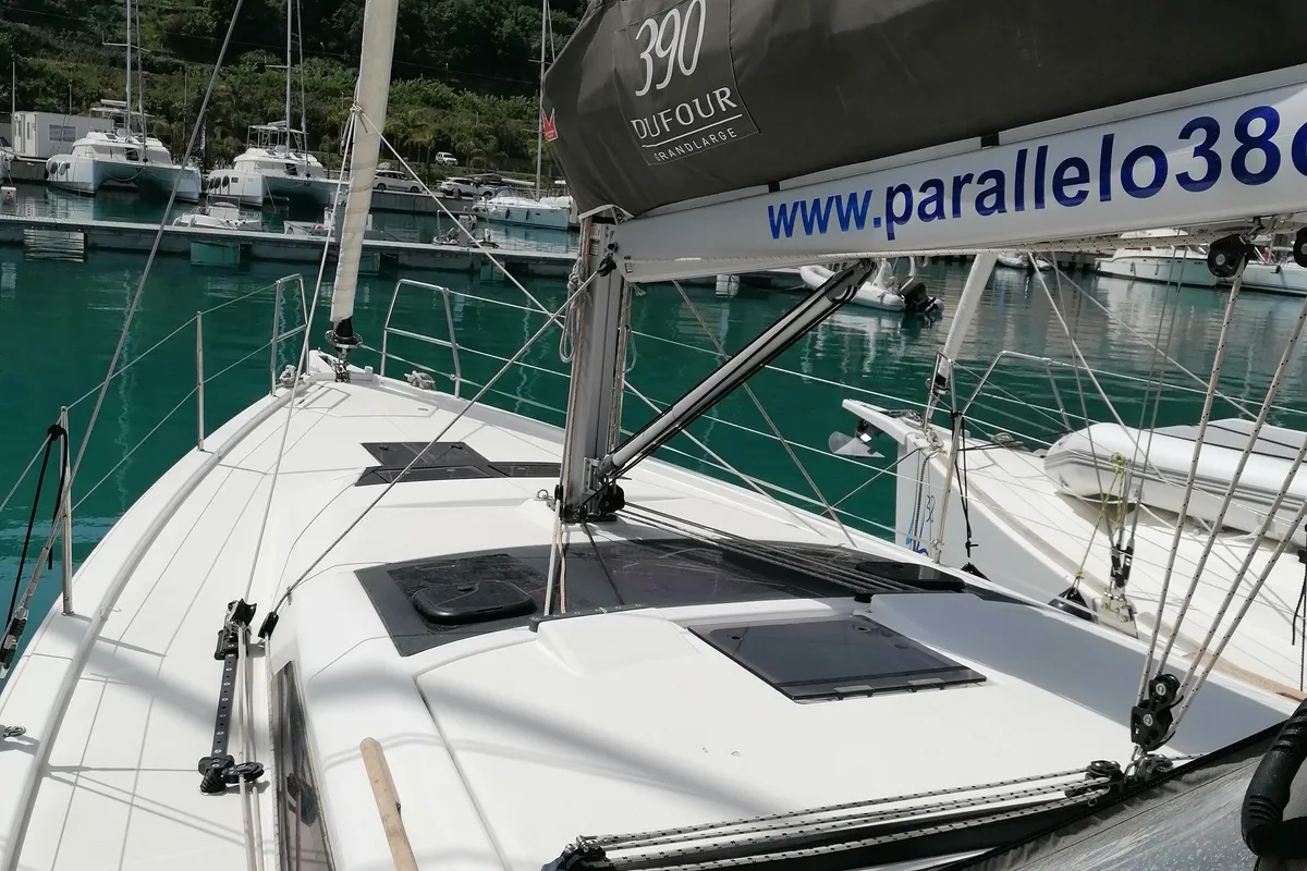 Exterior view of Parbleu, a Dufour 390 Grand Large sailboat at Capo d'Orlando, Italy