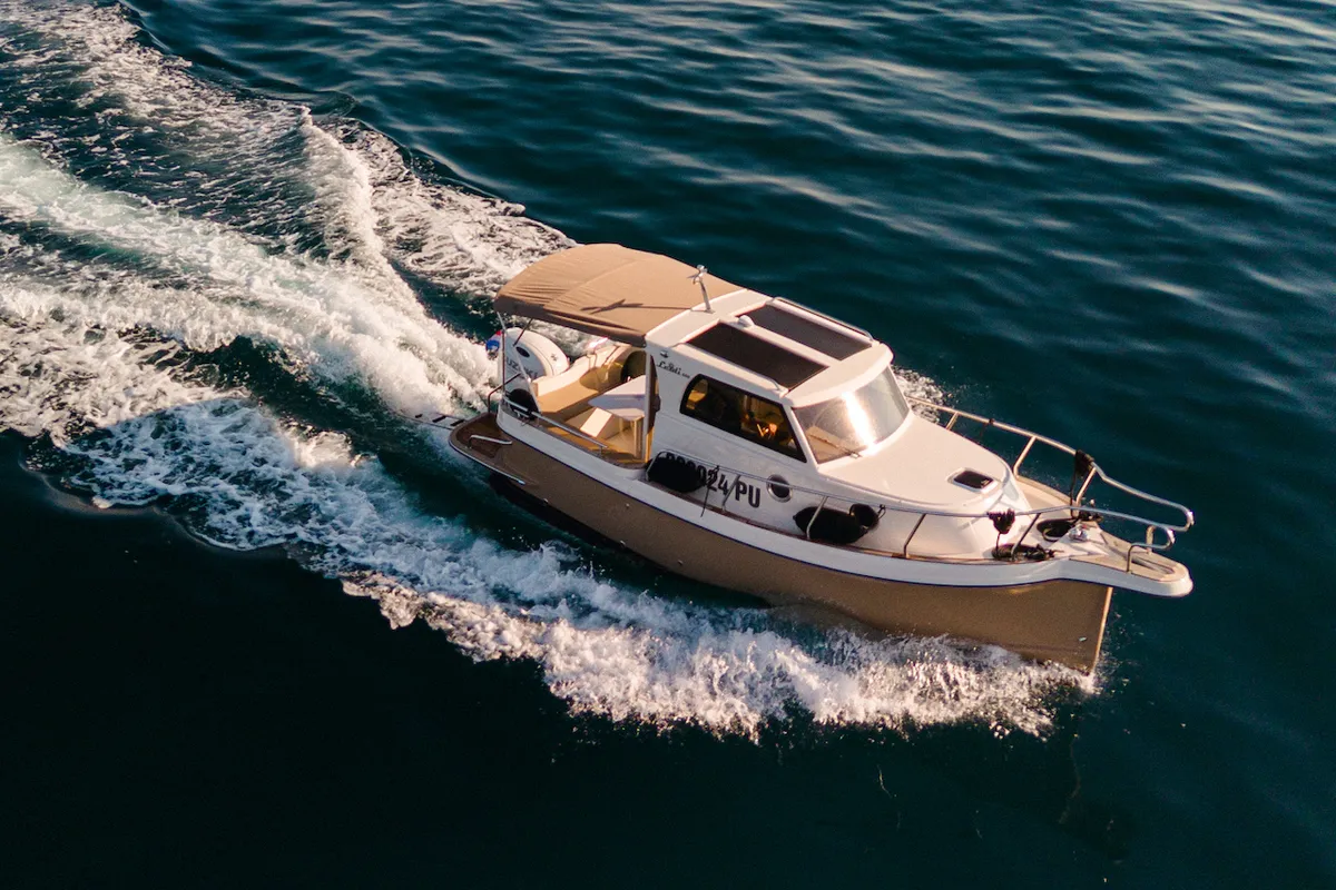 Exterior view of Bonaca, a Leidi 660 motorboat at Grad Pula, Croatia