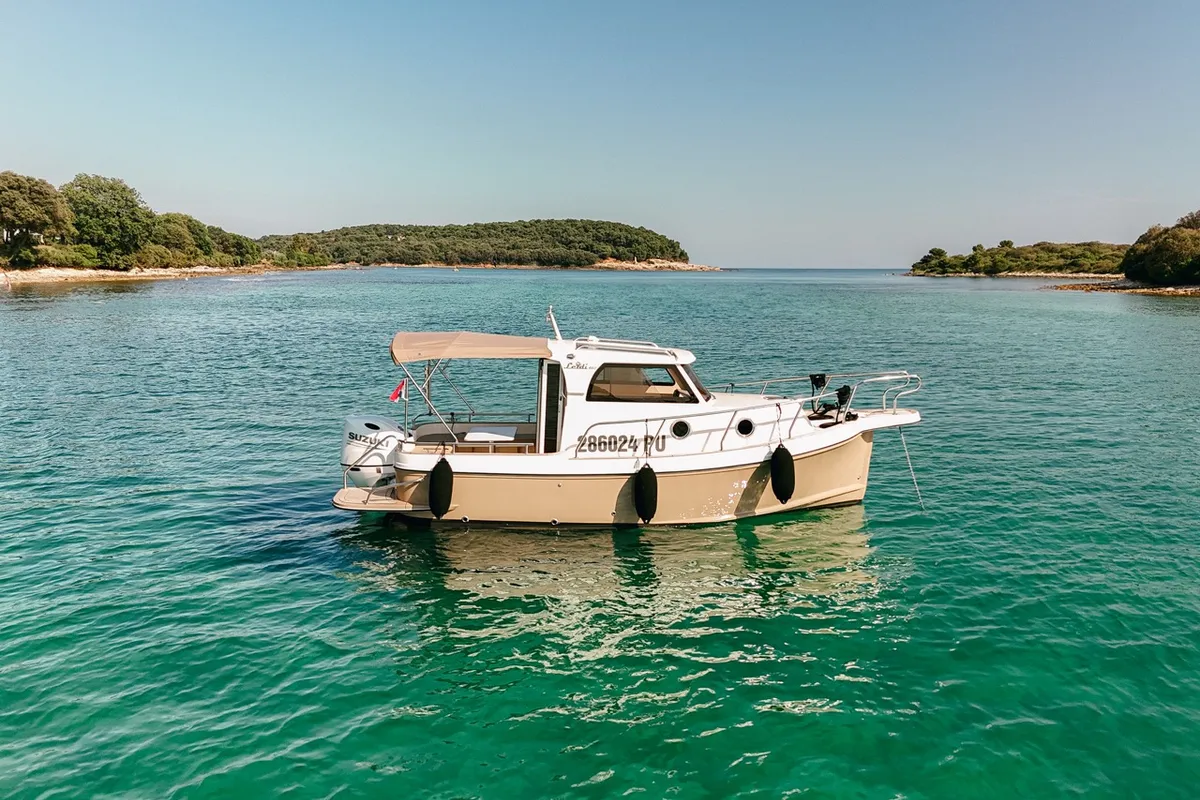 Exterior view of Bonaca, a Leidi 660 motorboat at Grad Pula, Croatia