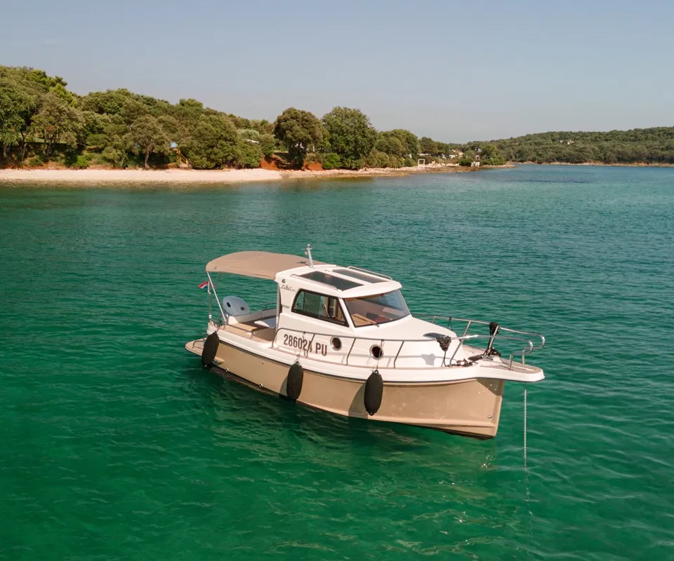 Exterior view of Bonaca, a Leidi 660 motorboat at Grad Pula, Croatia