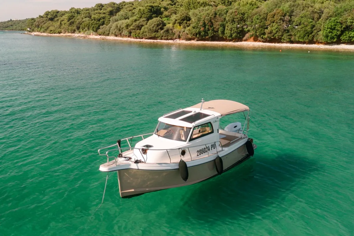 Exterior view of Bonaca, a Leidi 660 motorboat at Grad Pula, Croatia