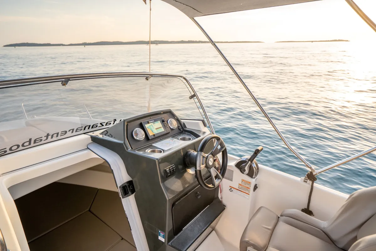 Cockpit of Quicksilver, a Quicksilver 605 Sundeck motorboat at Valbandon, Croatia
