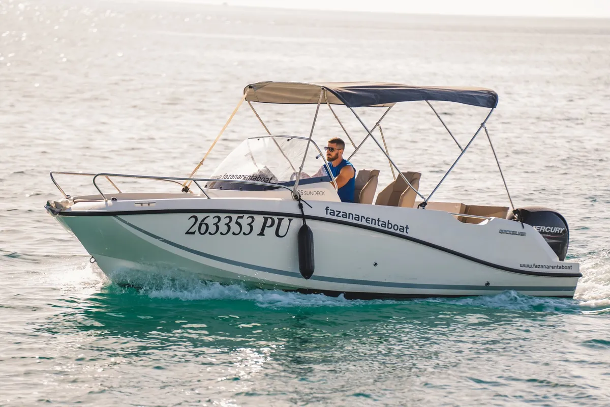 Exterior view of Quicksilver, a Quicksilver 605 Sundeck motorboat at Valbandon, Croatia