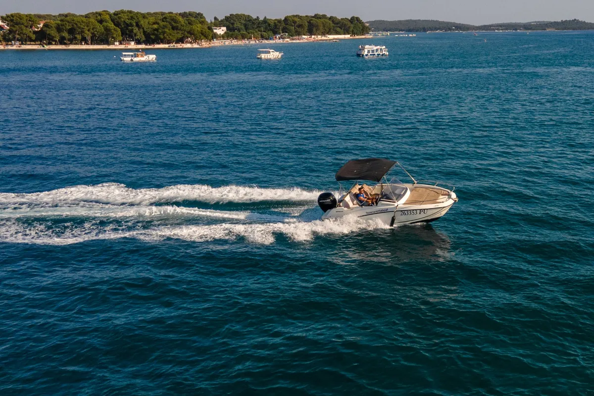 Exterior view of Quicksilver, a Quicksilver 605 Sundeck motorboat at Valbandon, Croatia