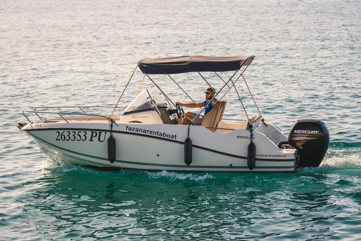 Exterior view of Quicksilver, a Quicksilver 605 Sundeck motorboat at Valbandon, Croatia