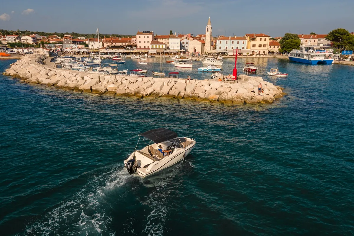 Exterior view of Quicksilver, a Quicksilver 605 Sundeck motorboat at Valbandon, Croatia