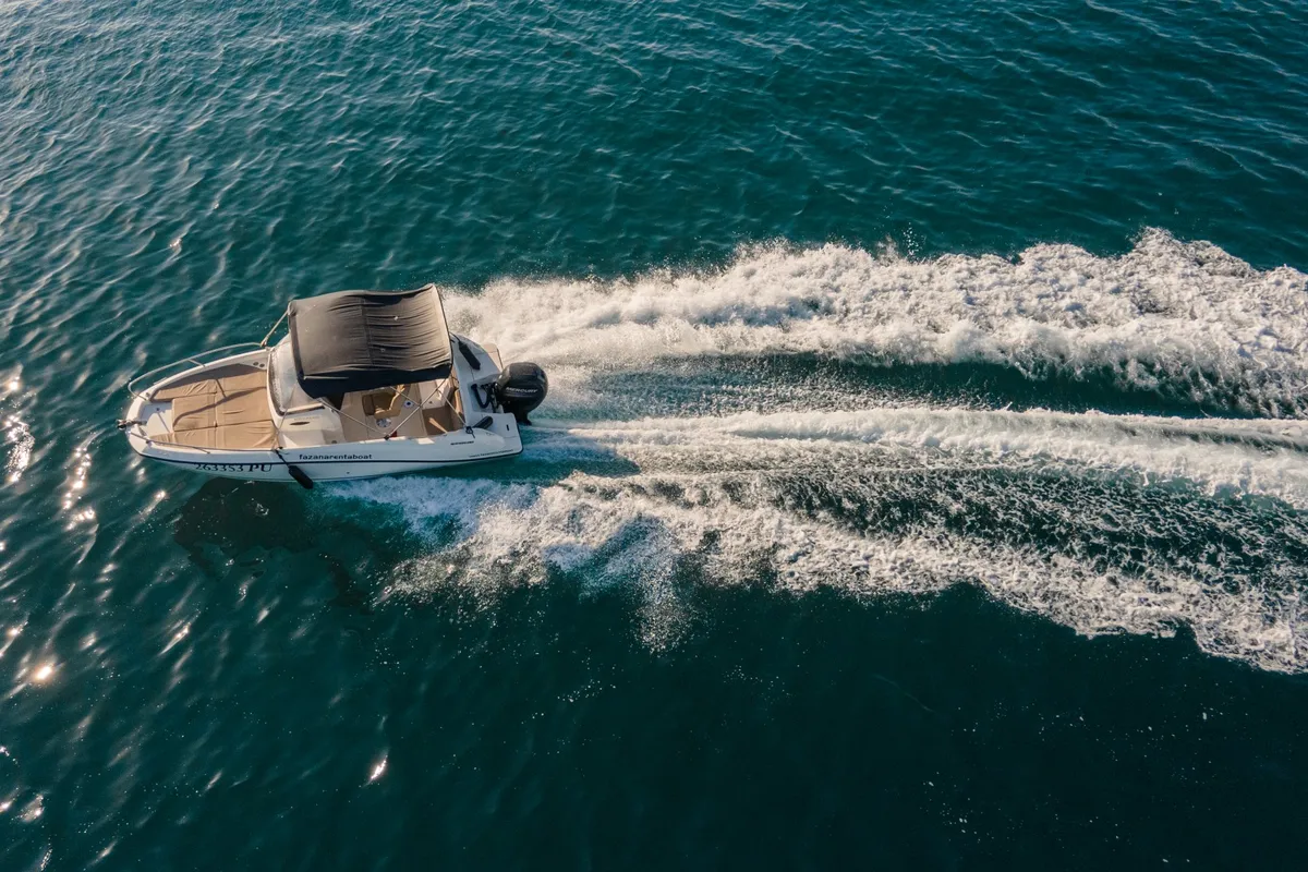 Exterior view of Quicksilver, a Quicksilver 605 Sundeck motorboat at Valbandon, Croatia