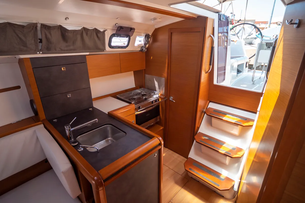 FIRRINGALLO, a Jeanneau Sun Odyssey 349 sailboat at es Jonquet, Spain