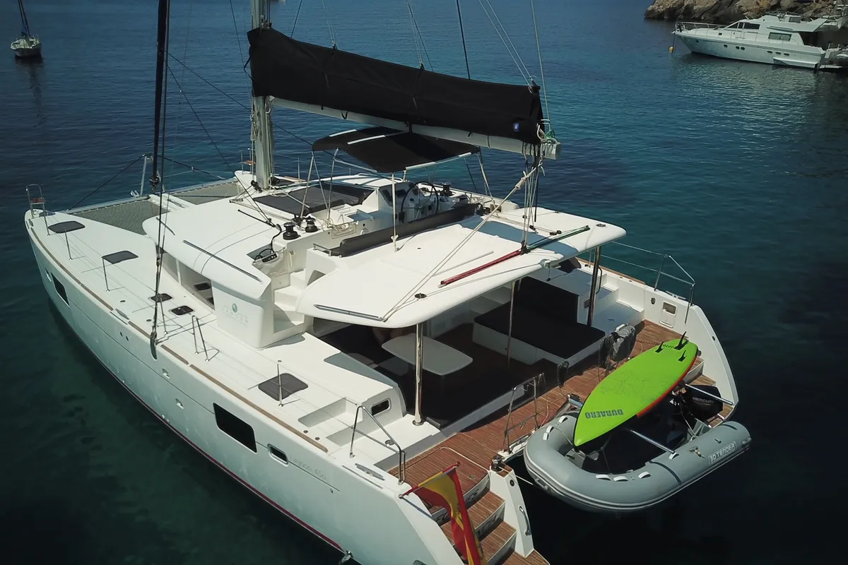 Exterior view of Fornes, a Lagoon 450 Fly catamaran at Ibiza, Spain