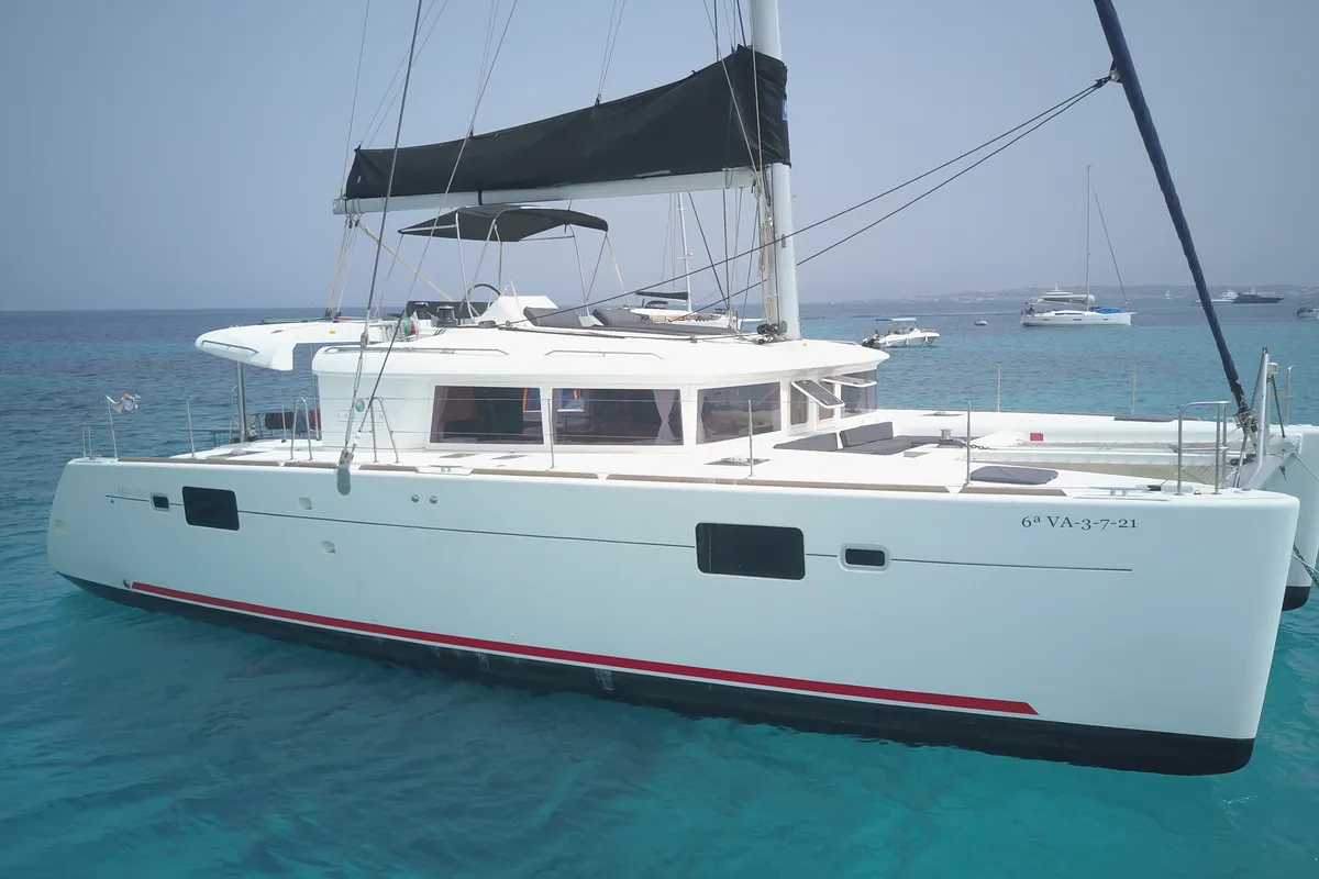 Exterior view of Fornes, a Lagoon 450 Fly catamaran at Ibiza, Spain