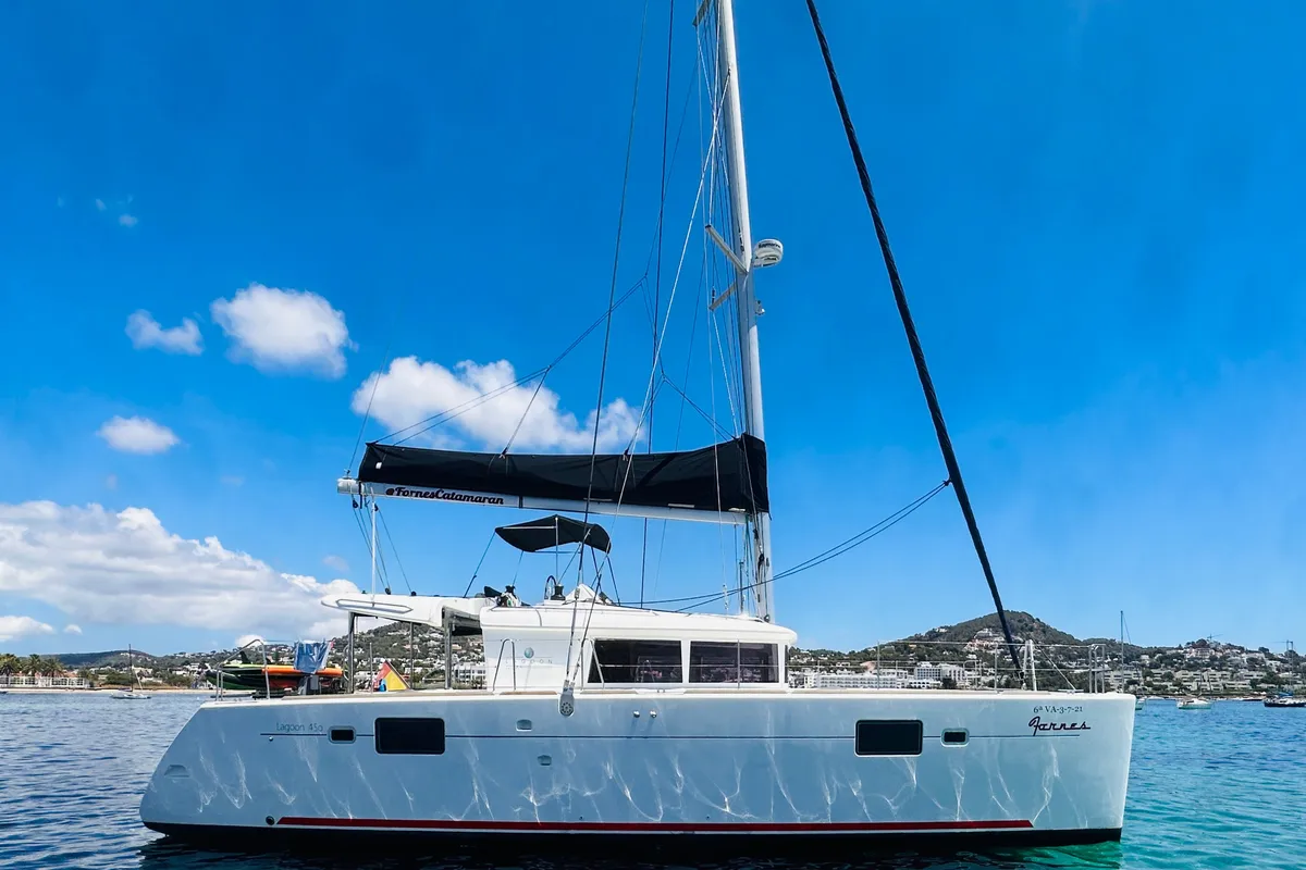 Exterior view of Fornes, a Lagoon 450 Fly catamaran at Ibiza, Spain