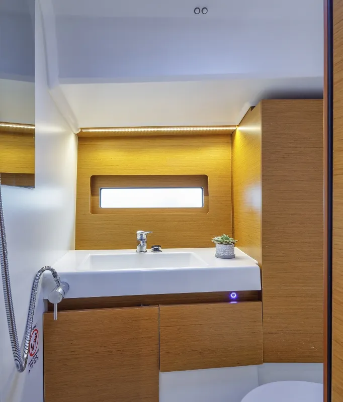 Head on Discovery Blue, a Jeanneau Sun Loft 47 sailboat at Municipal Unit of Nea Peramos, Greece