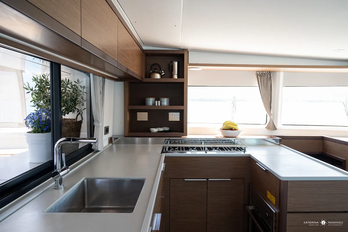 Galley of El Marita Brand New 2021 A/C & Generator Skippered, a Lagoon 46 catamaran at Municipal Unit of Lefkada, Greece