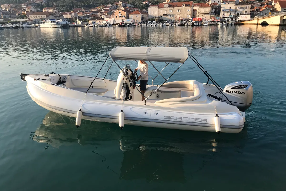 Exterior view of Envy Tender, a Scanner 710 motorboat at Trogir, Croatia