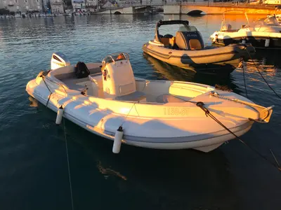 Exterior view of Envy Tender, a Scanner 710 motorboat at Trogir, Croatia