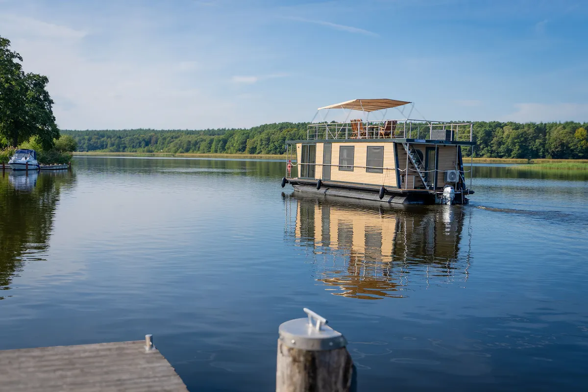 Exterior view of Juno, a Woma D13 motorboat at Fürstenberg/Havel, Germany