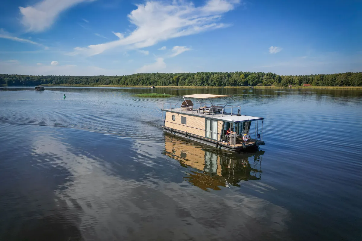Exterior view of Juno, a Woma D13 motorboat at Fürstenberg/Havel, Germany