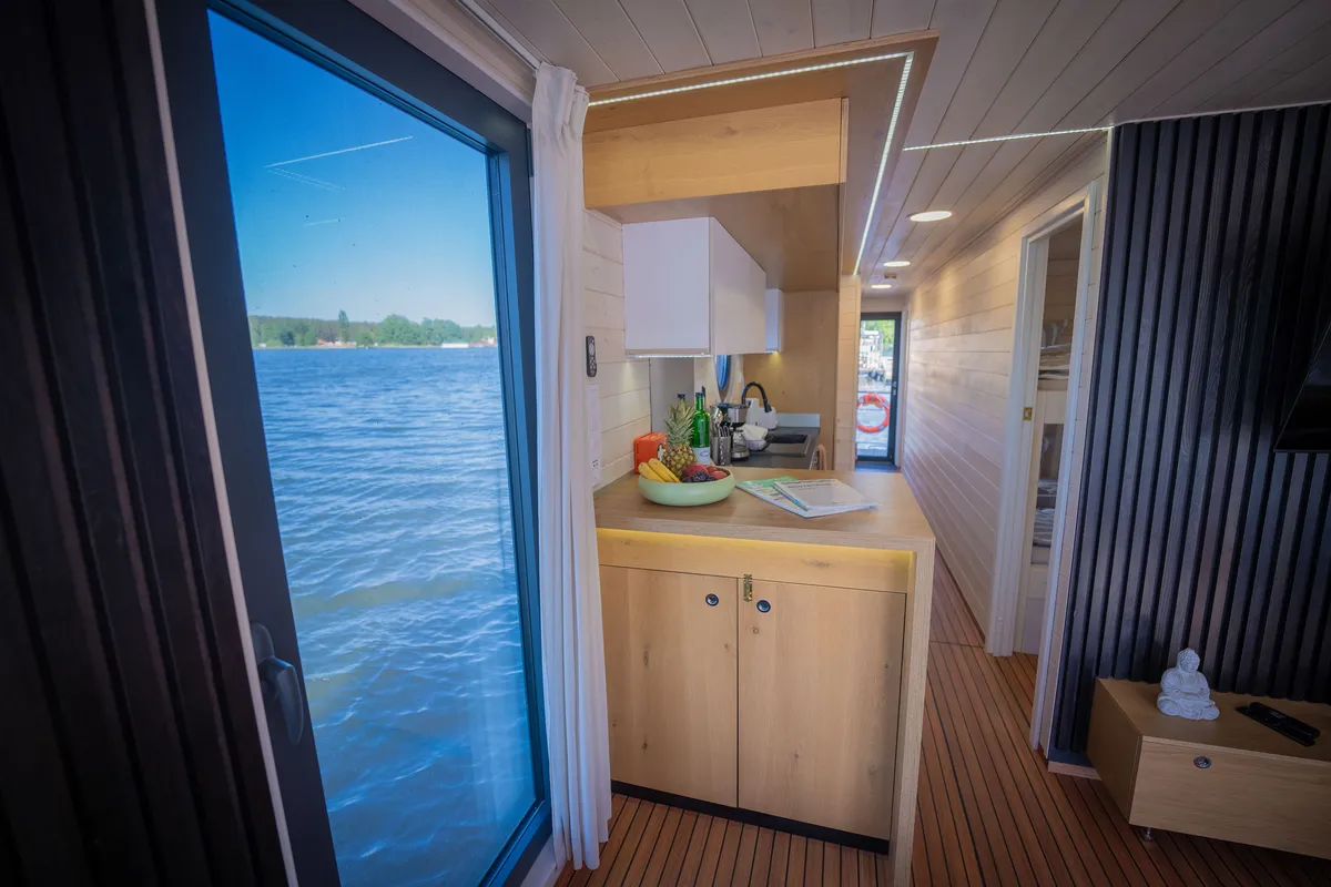 Galley of Juno, a Woma D13 motorboat at Fürstenberg/Havel, Germany