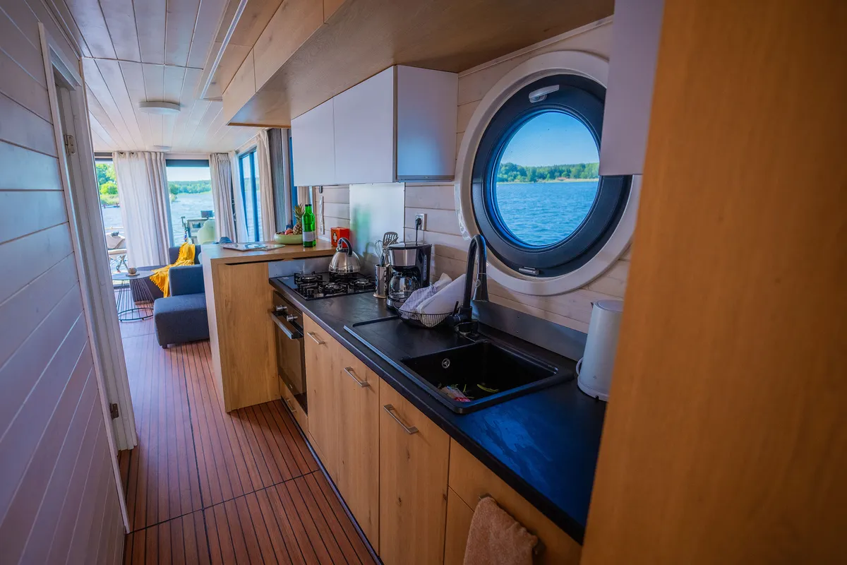 Galley of Juno, a Woma D13 motorboat at Fürstenberg/Havel, Germany