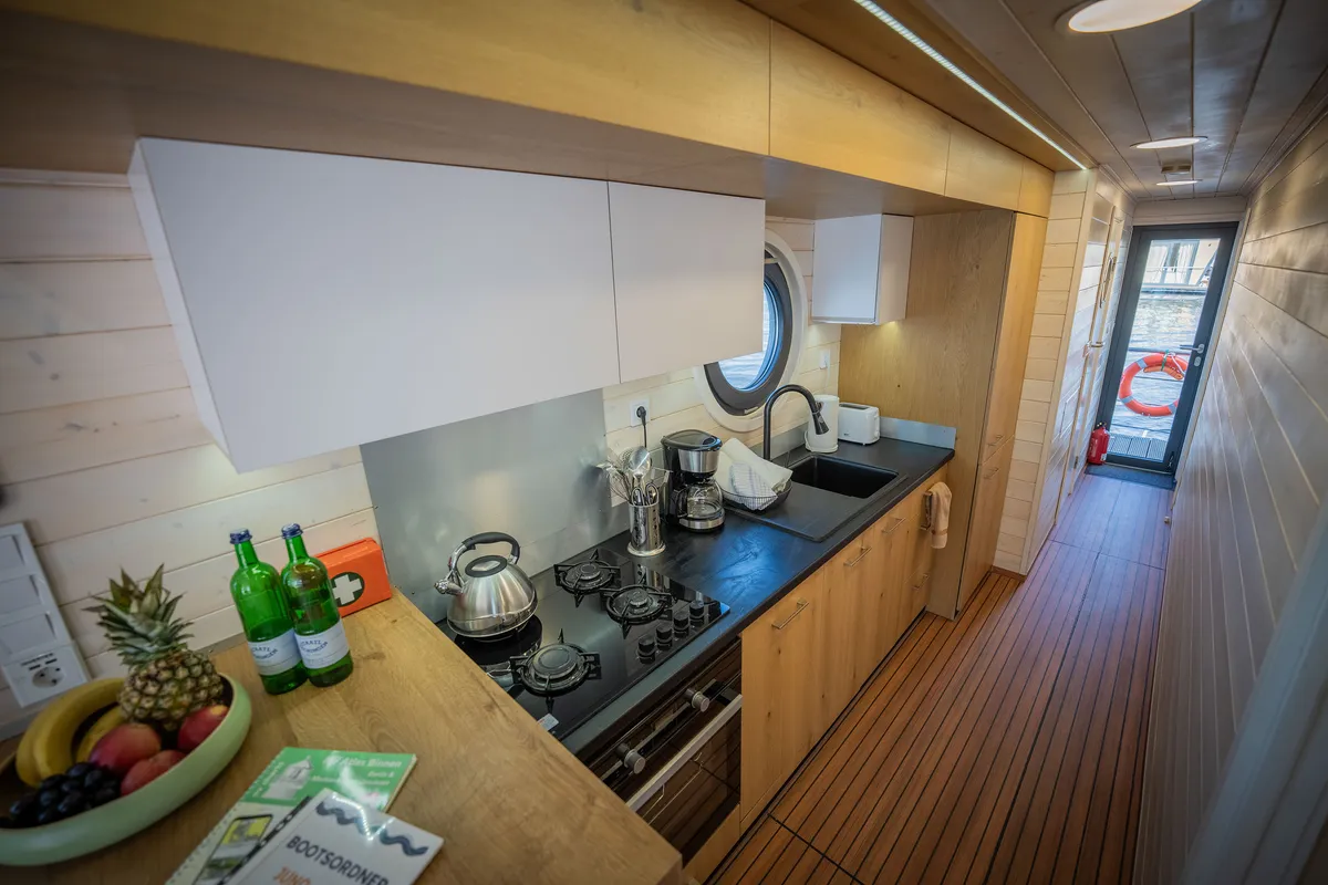 Galley of Juno, a Woma D13 motorboat at Fürstenberg/Havel, Germany