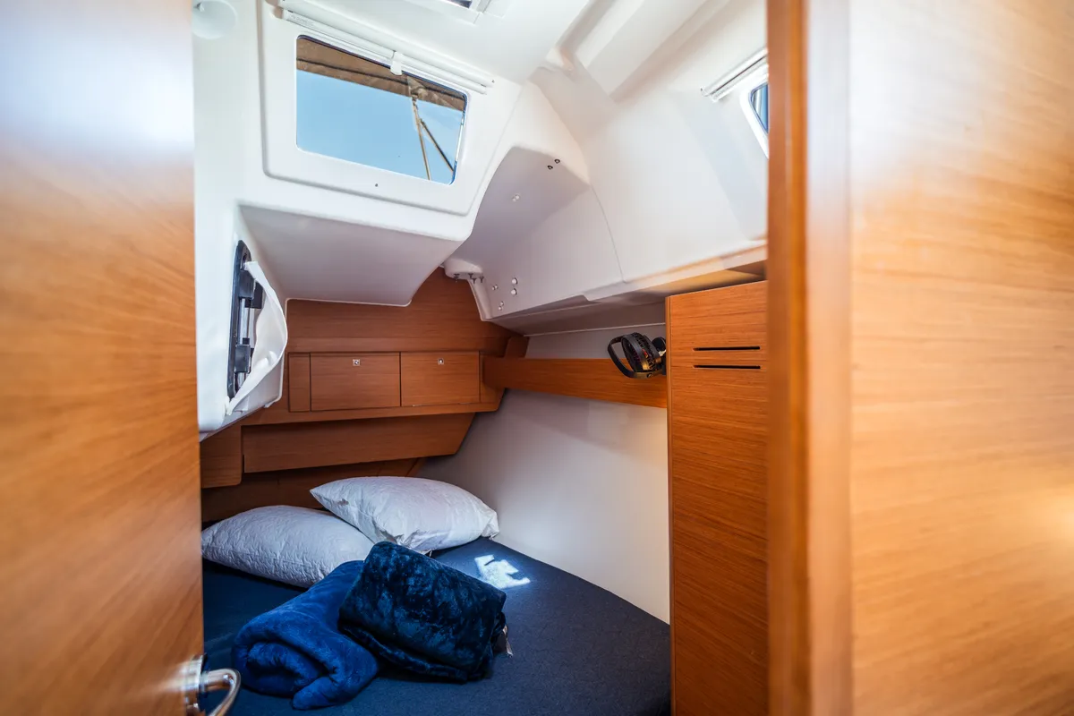 Cabin on Monia, a Dufour 360 Grand Large sailboat at Olbia, Italy