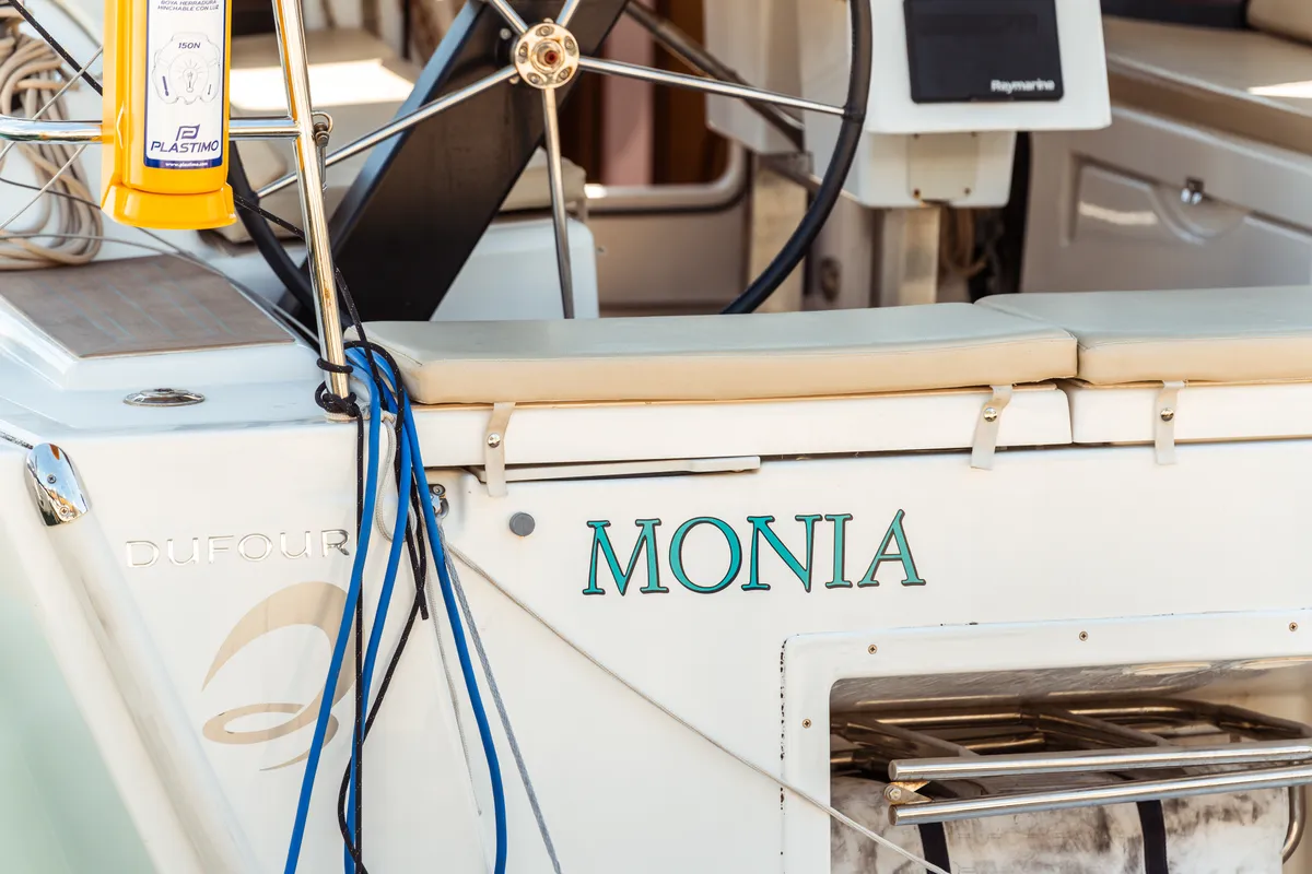 Monia, a Dufour 360 Grand Large sailboat at Olbia, Italy