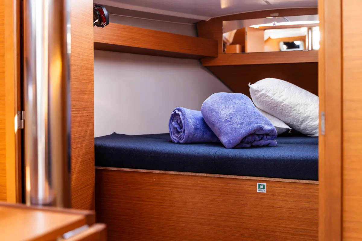 Cabin on Monia, a Dufour 360 Grand Large sailboat at Olbia, Italy