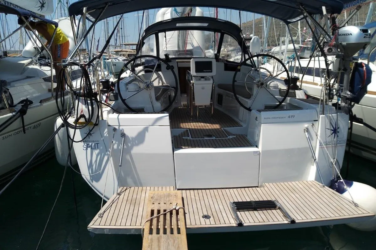 Exterior view of Tumbleweed, a Jeanneau Sun Odyssey 419 sailboat at Kontokali, Greece
