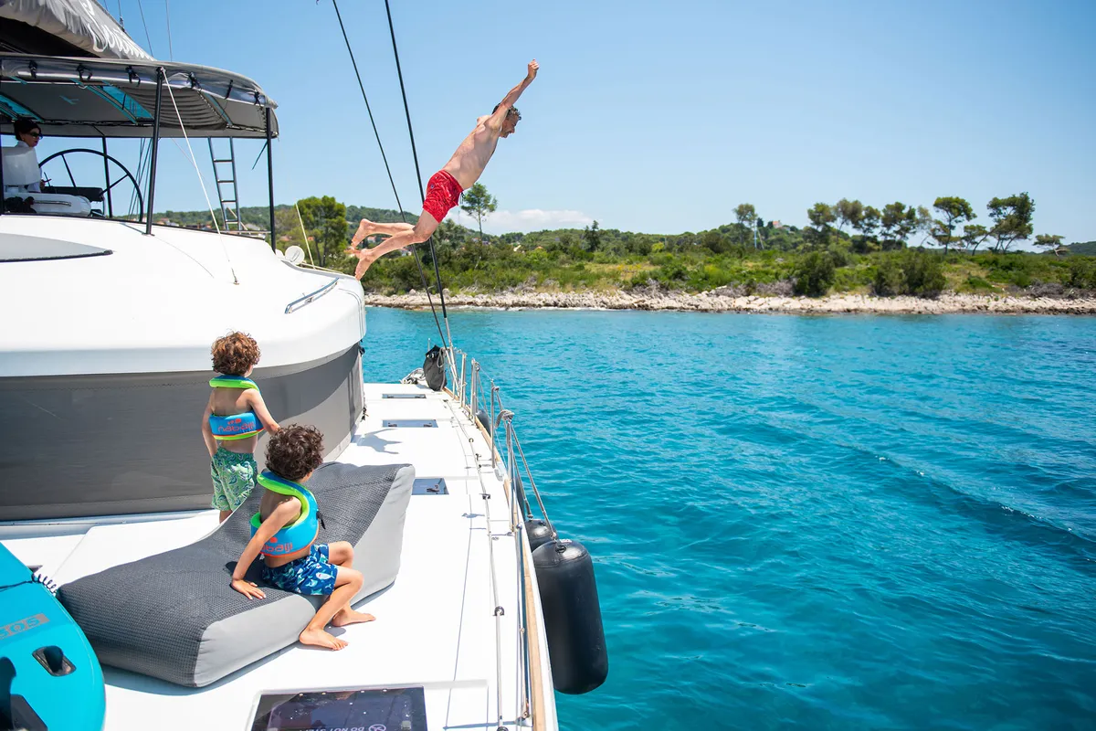 Exterior view of Serenity I, a Lagoon 52F catamaran at Grad Kaštela, Croatia