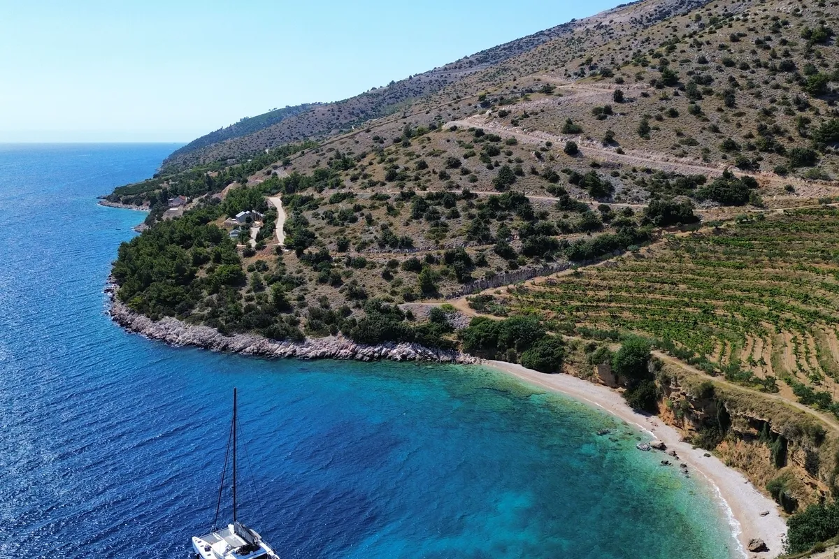 Exterior view of Serenity I, a Lagoon 52F catamaran at Grad Kaštela, Croatia