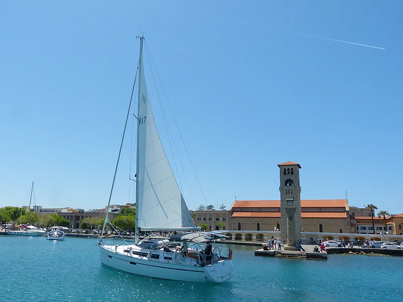 Exterior view of Nenemia, a Bavaria Cruiser 37 sailboat at Rhodes, Greece