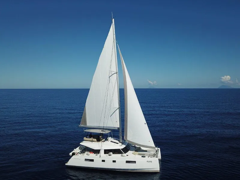 Exterior view of Calypso, a Nautitech 46 Fly catamaran at Capo d'Orlando, Italy
