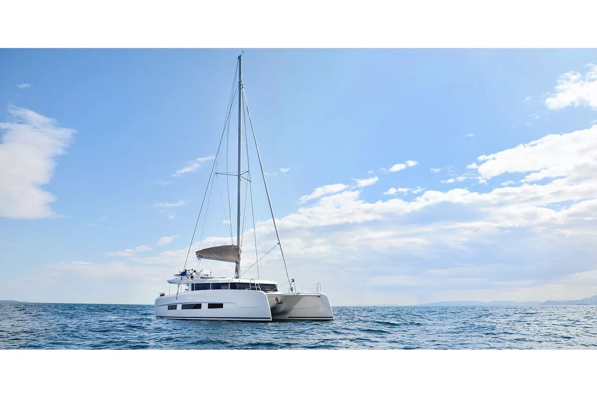 Exterior view of Hawaii 5-0 - Skippered, a Dufour Catamaran 48 catamaran at Parikia, Greece