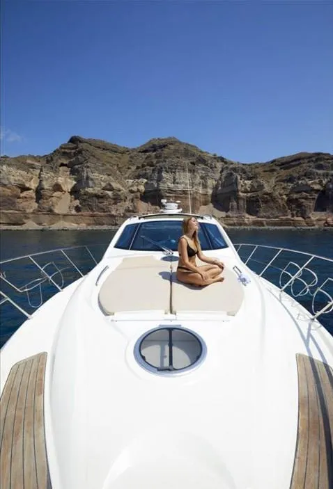 Agia Marina, a Cranchi Mediterranee 43 motorboat at Thira Municipal Unit, Greece