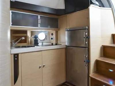 Galley of Agia Marina, a Cranchi Mediterranee 43 motorboat at Thira, Greece