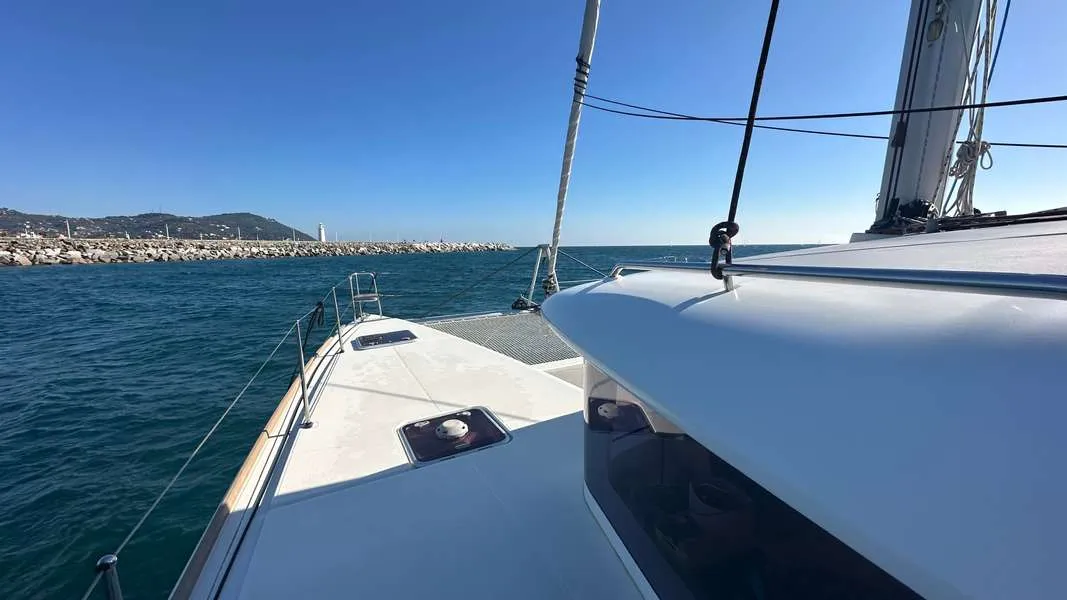 Exterior view of Branchia, a Lagoon 450 Fly catamaran at Naples, Italy
