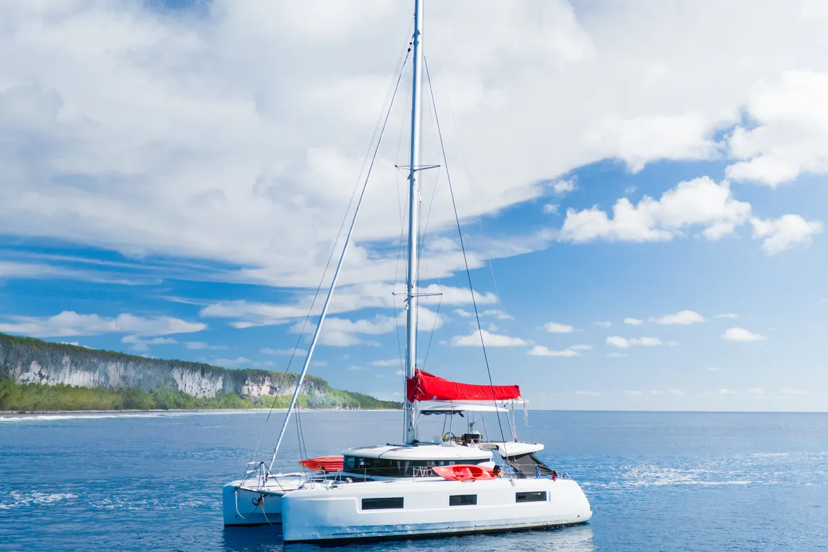Exterior view of Poe Rava, a Lagoon 46 catamaran at Papeete, France