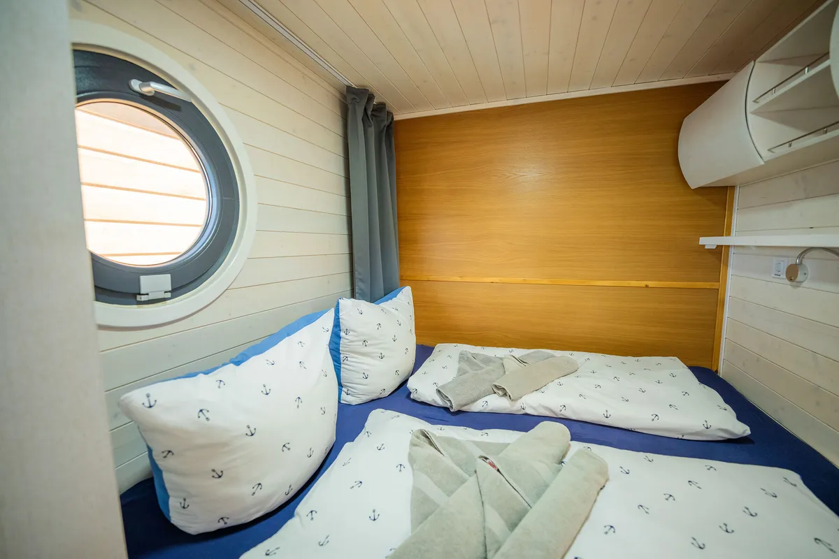 Cabin on Brino, a Woma D13 motorboat at Fürstenberg, Germany