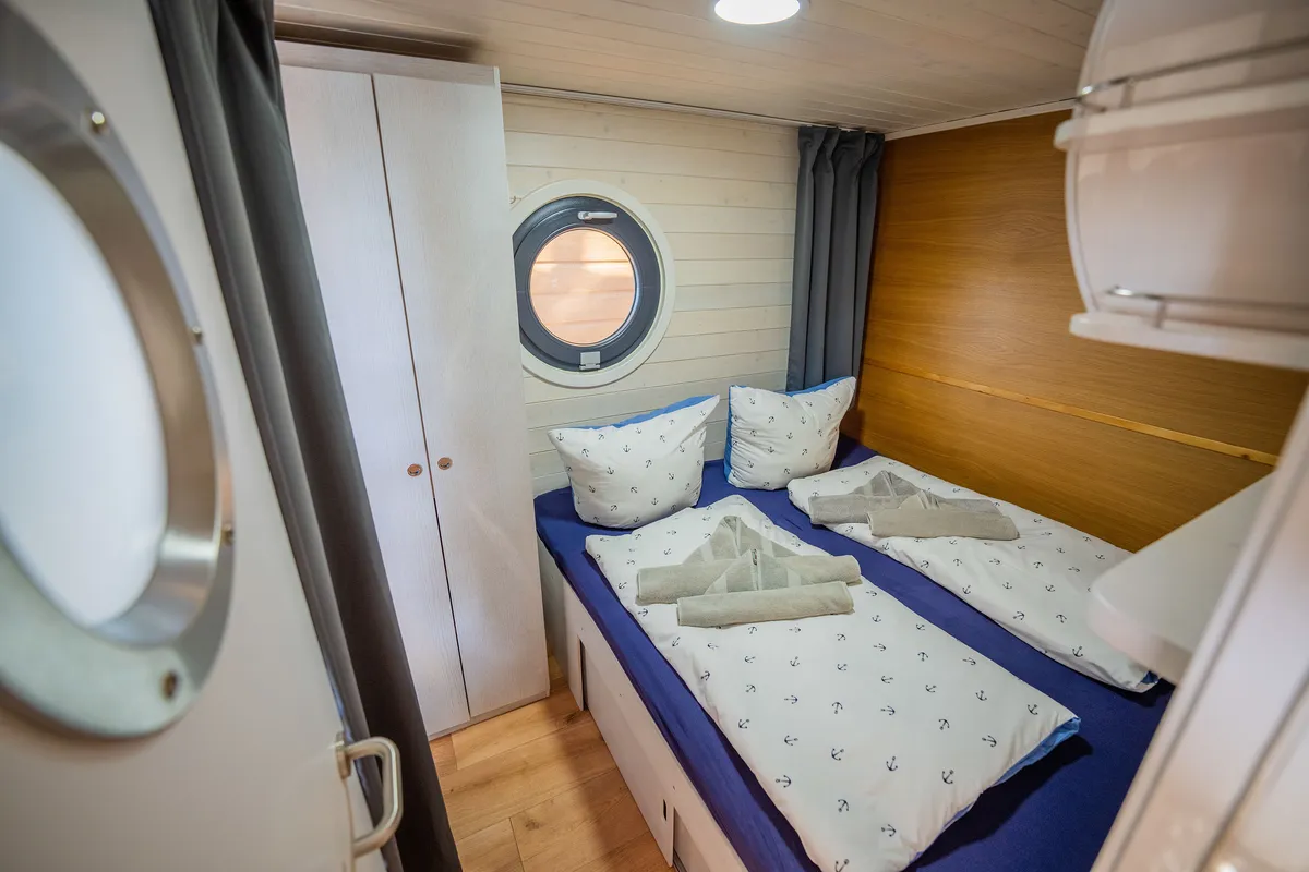 Cabin on Brino, a Woma D13 motorboat at Fürstenberg, Germany
