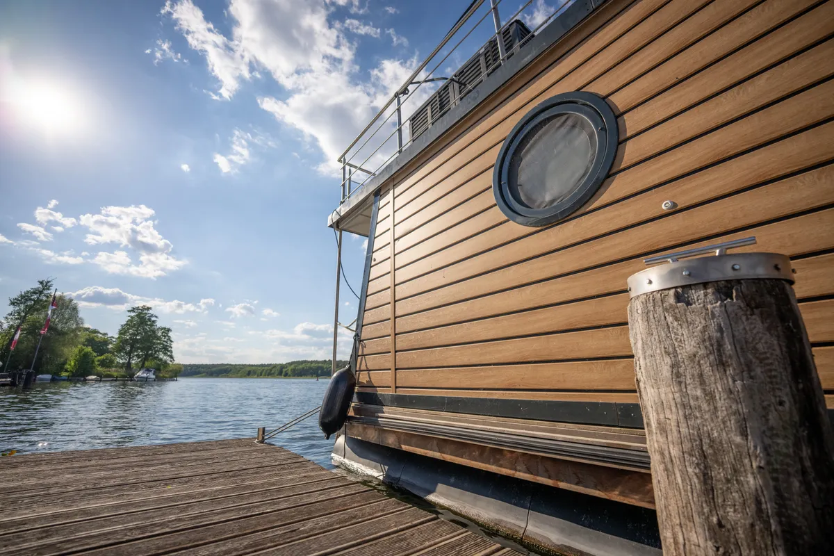 Exterior view of Brino, a Woma D13 motorboat at Fürstenberg, Germany